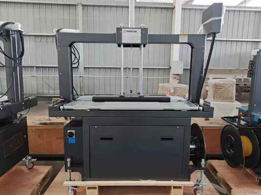 Качество  Semi-Automatic 1200mm Carton Box Strapping Machine with One Year Warranty for Efficient Packing Фабрика
